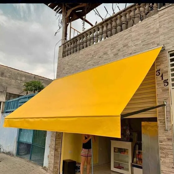 Toldo Cortina com Braços Laterais em Osasco SP — Instalação em fachada comercial